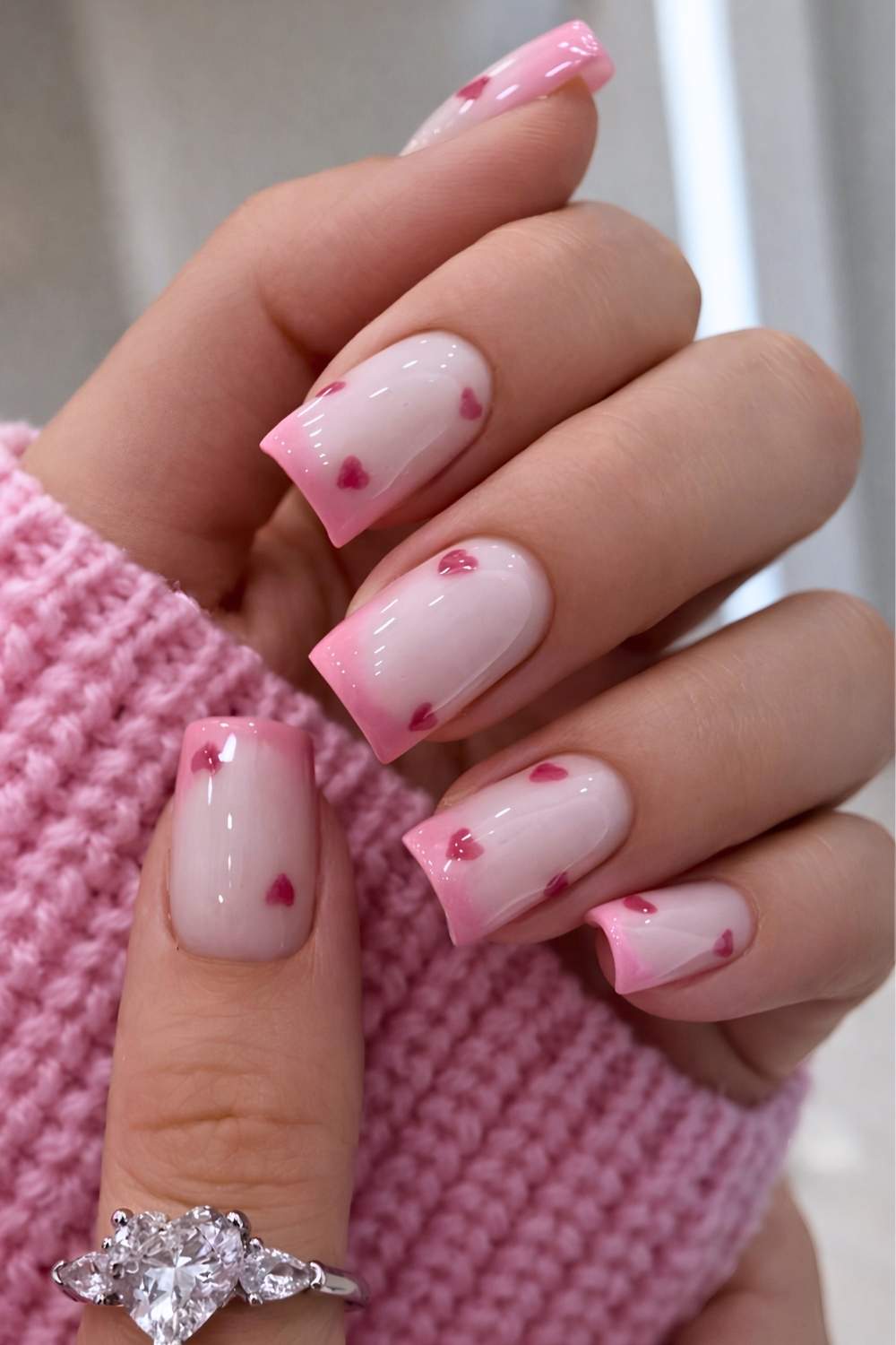 Square pink French mani with accent hearts