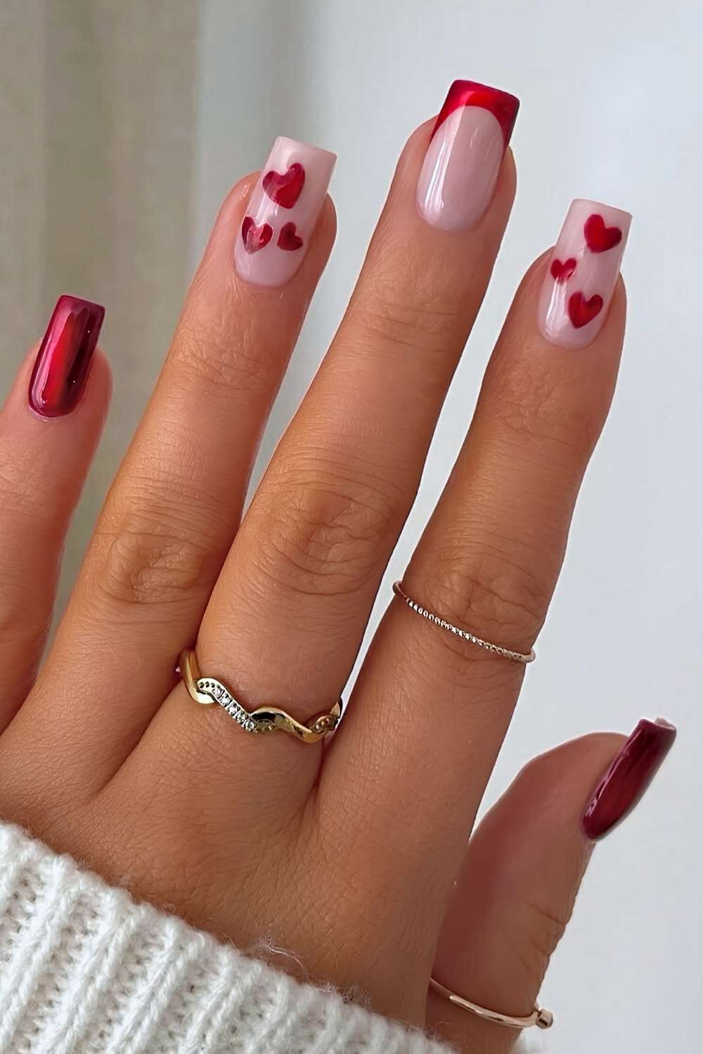Square red chrome nails with hearts