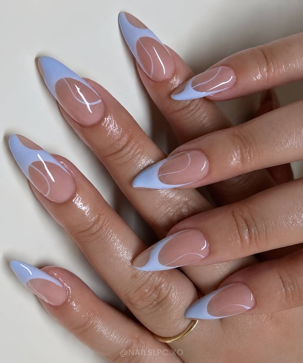 Swirly blue French tip manicure