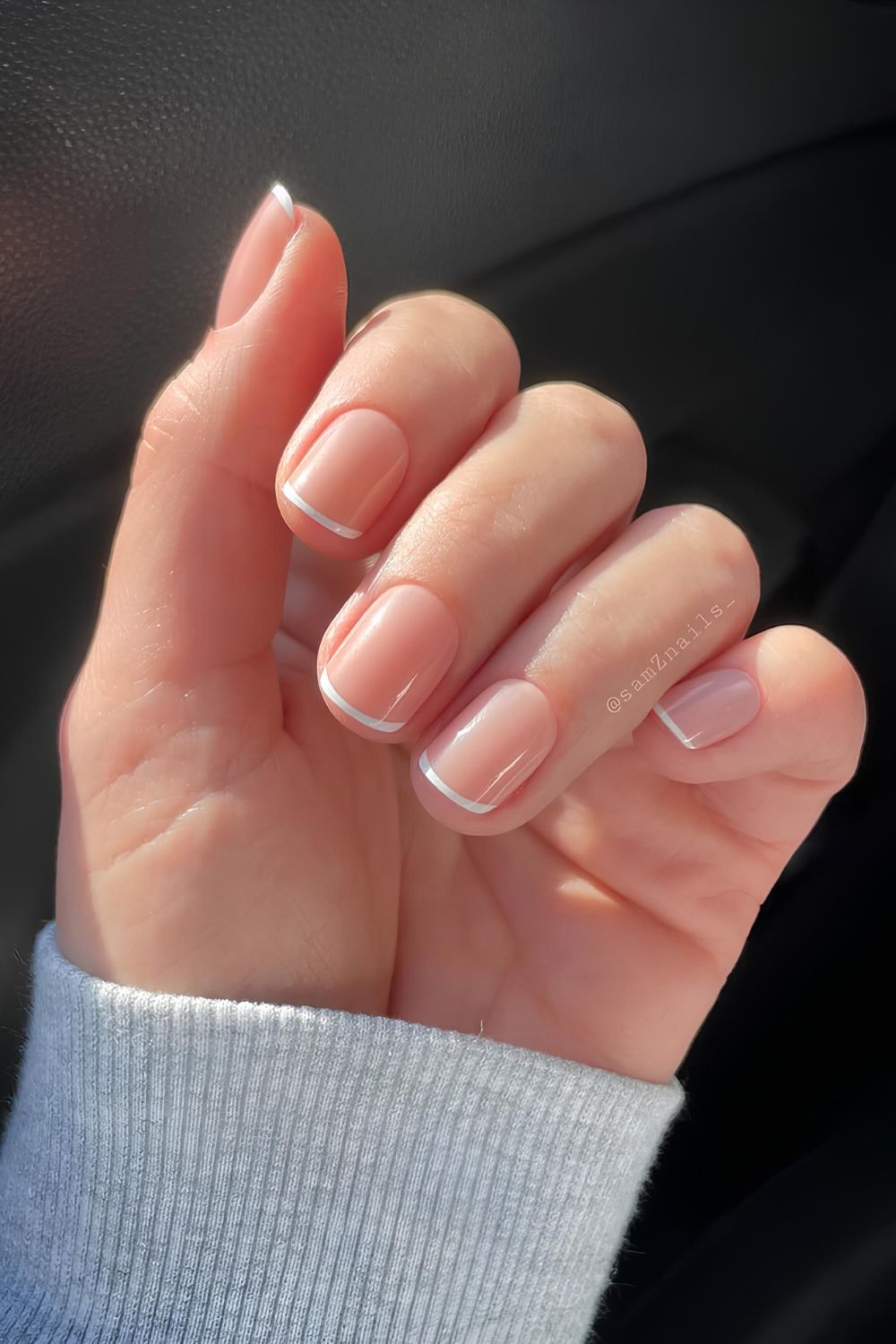 Thin white French nails