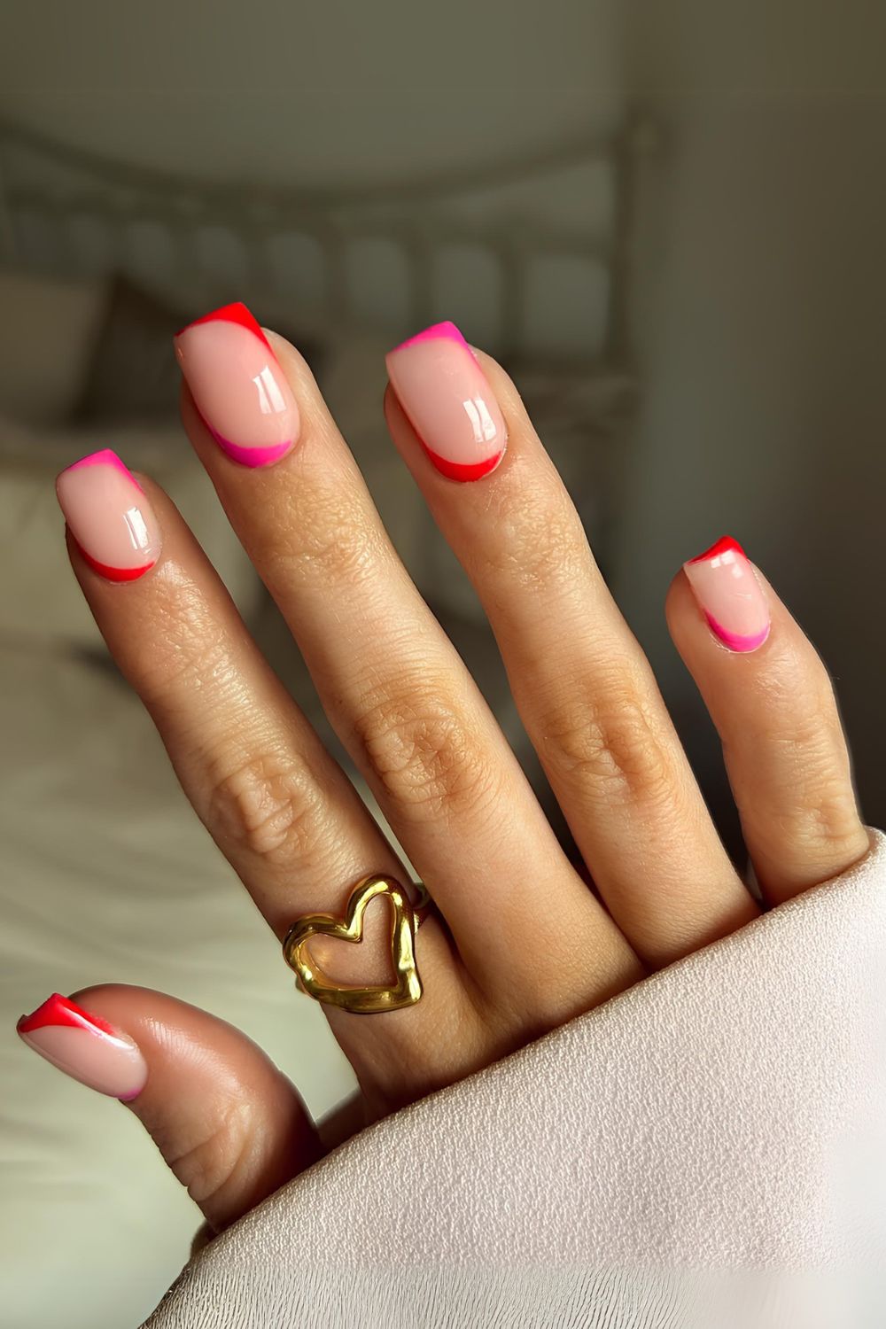 Upside down french tips in pink and red color