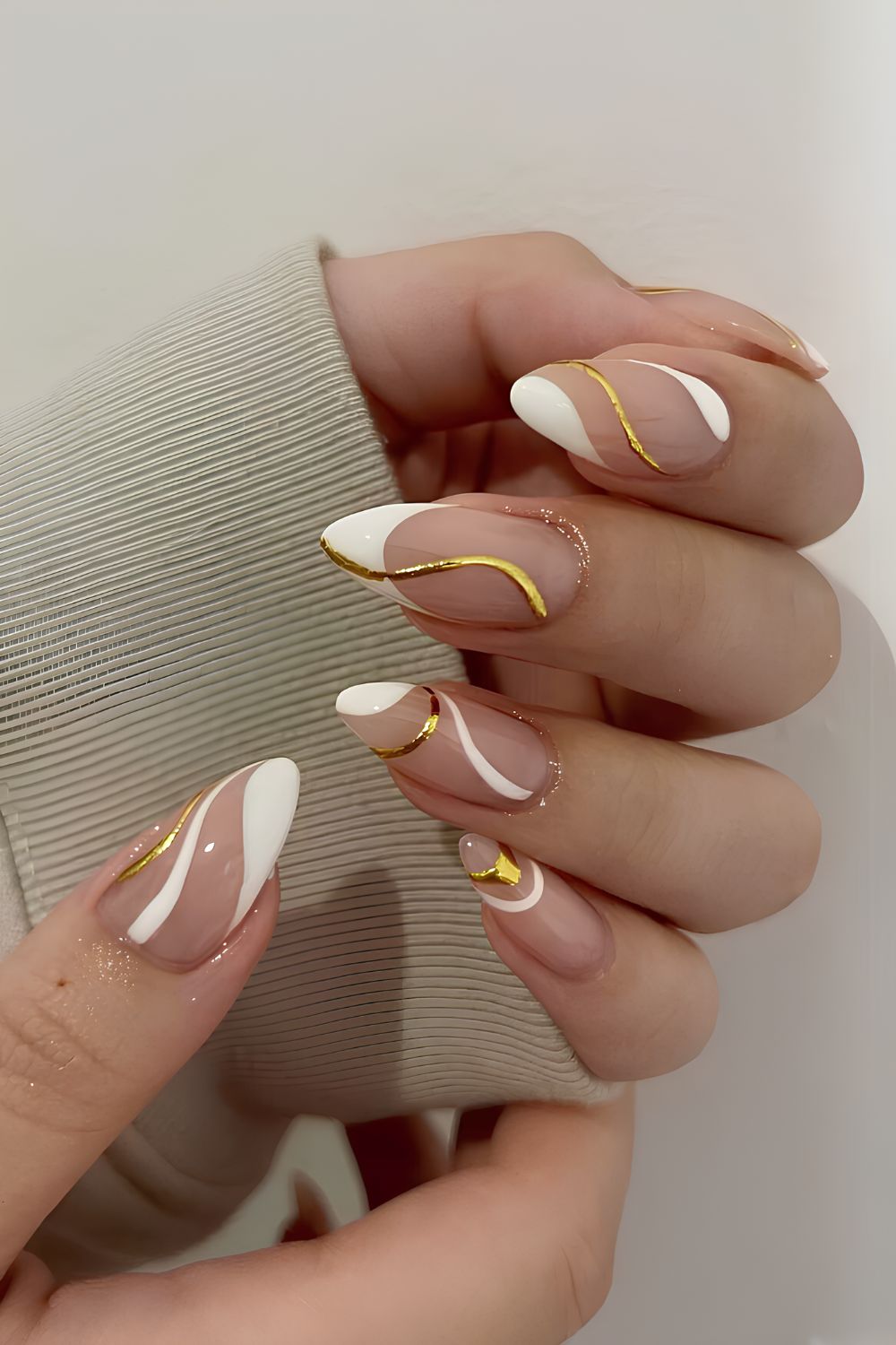 White French mani with gold swirls