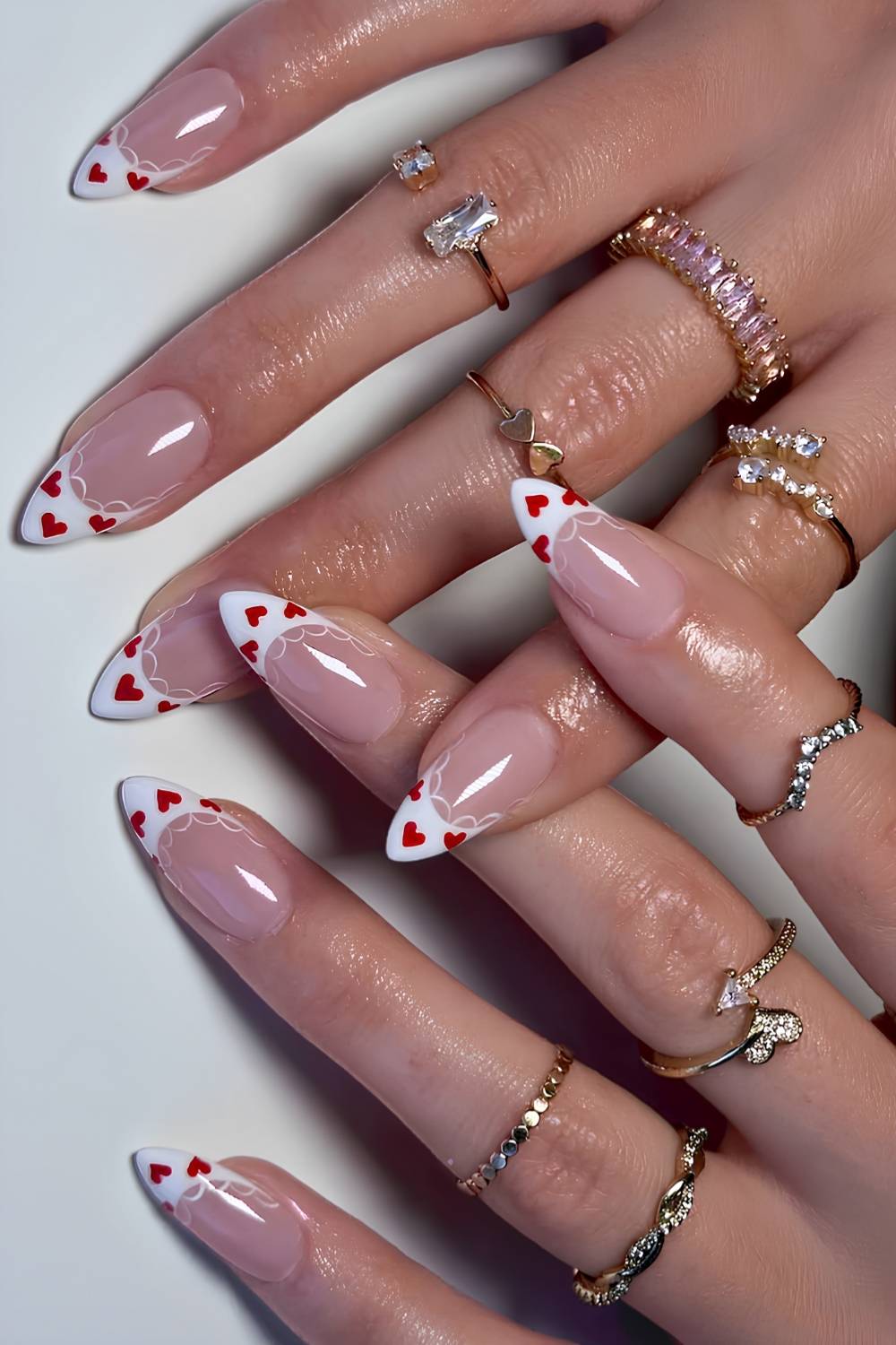 White French mani with heart and lace art details