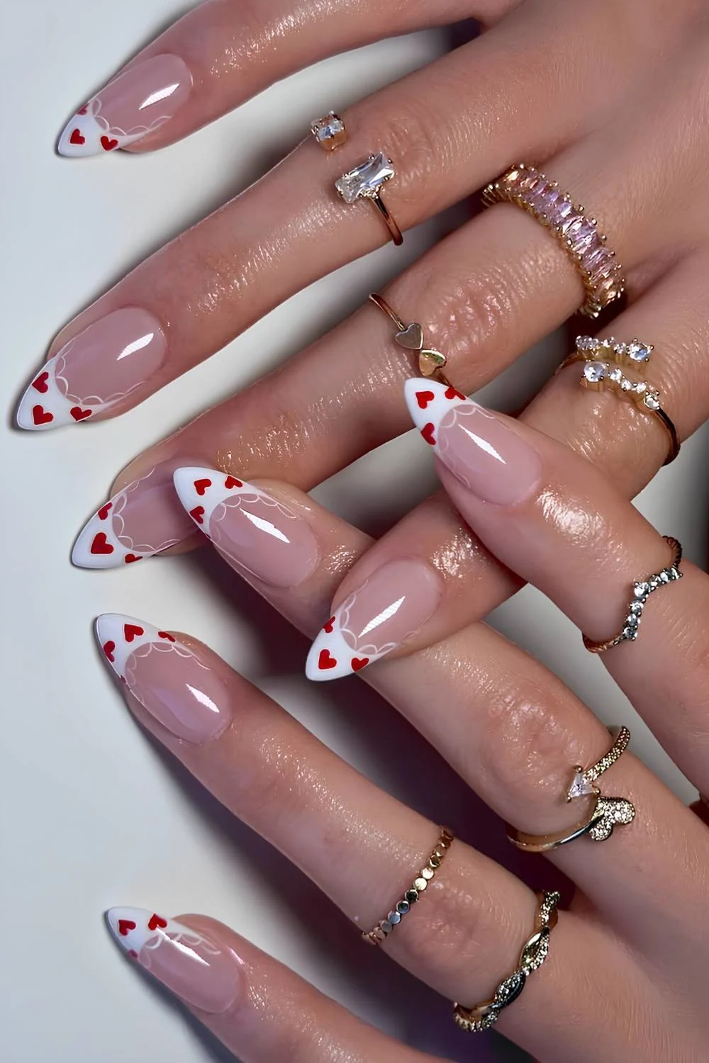 White French mani with heart and lace art details