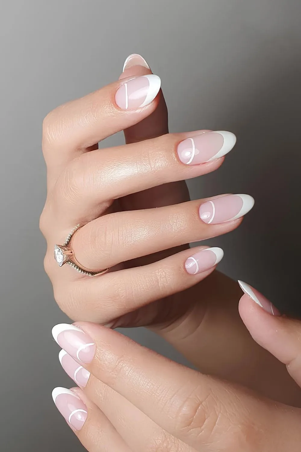 White French nails with half moon accents