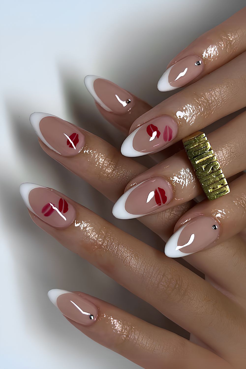 White French nails with kissy lip art