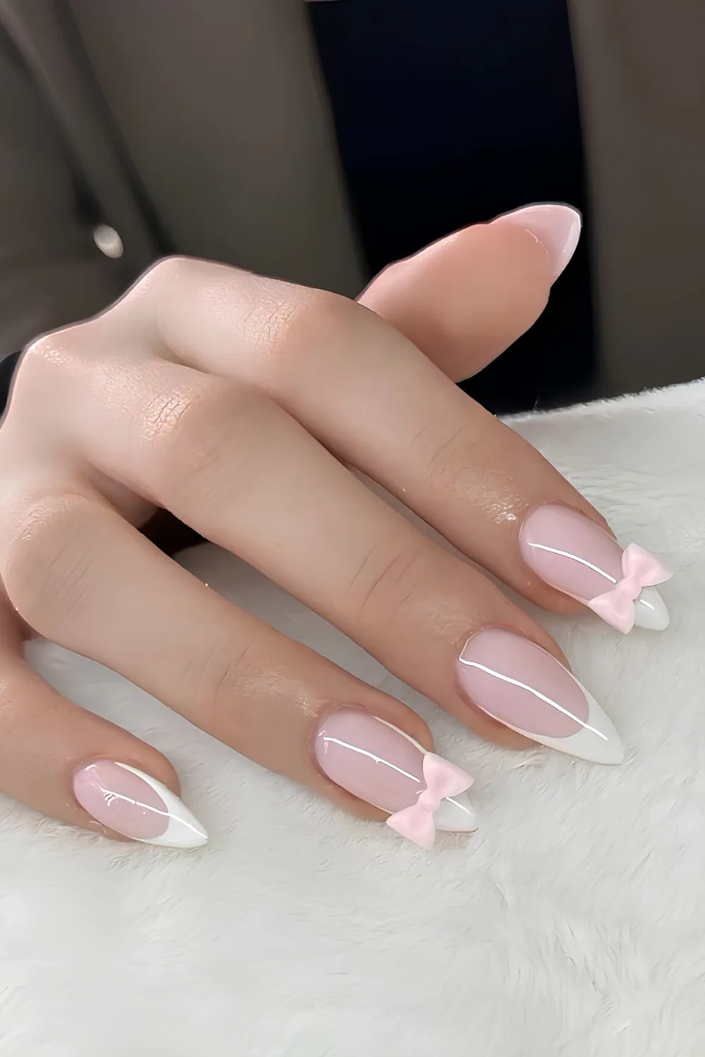 White French nails with pink 3D bows