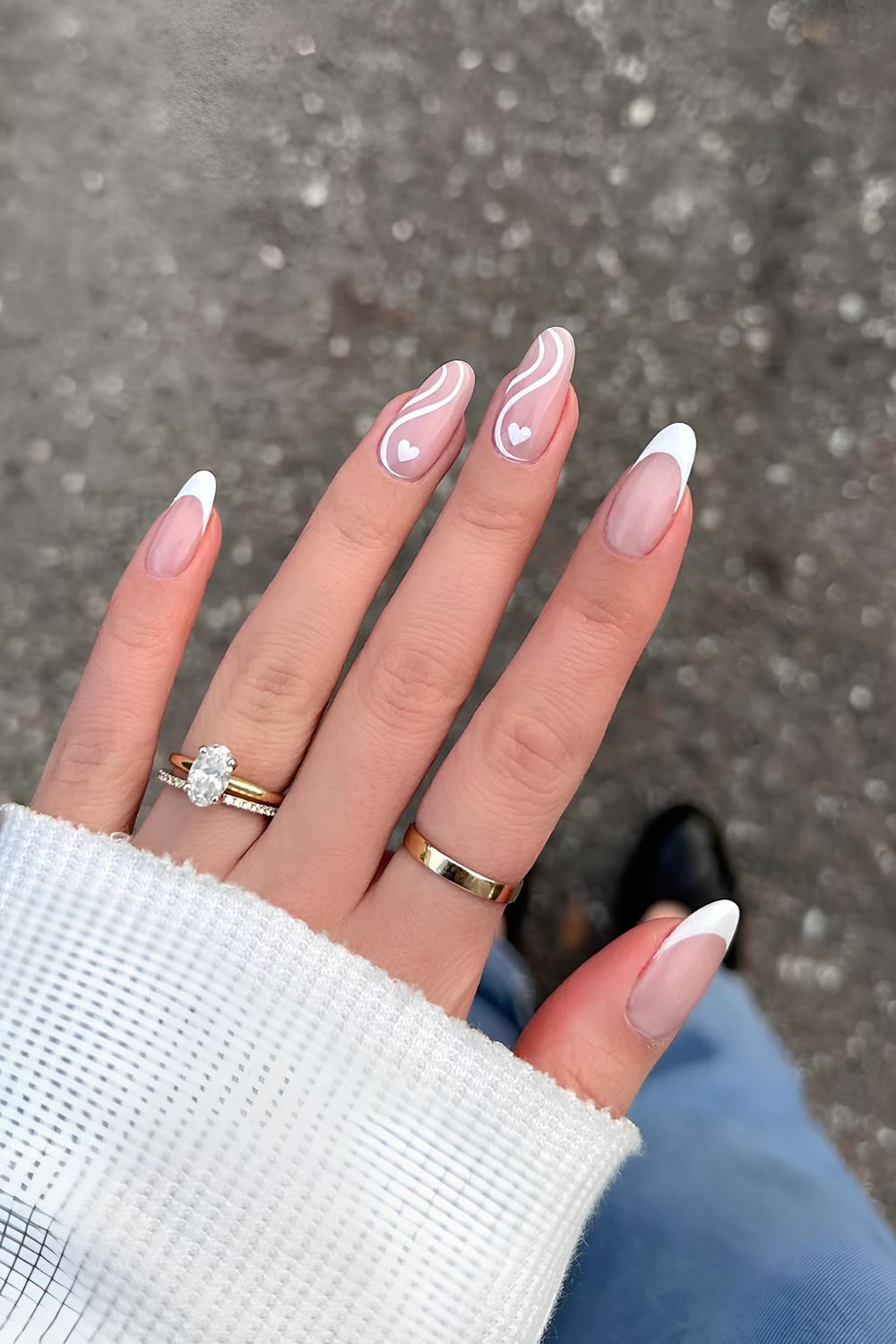 White French nails with swirls