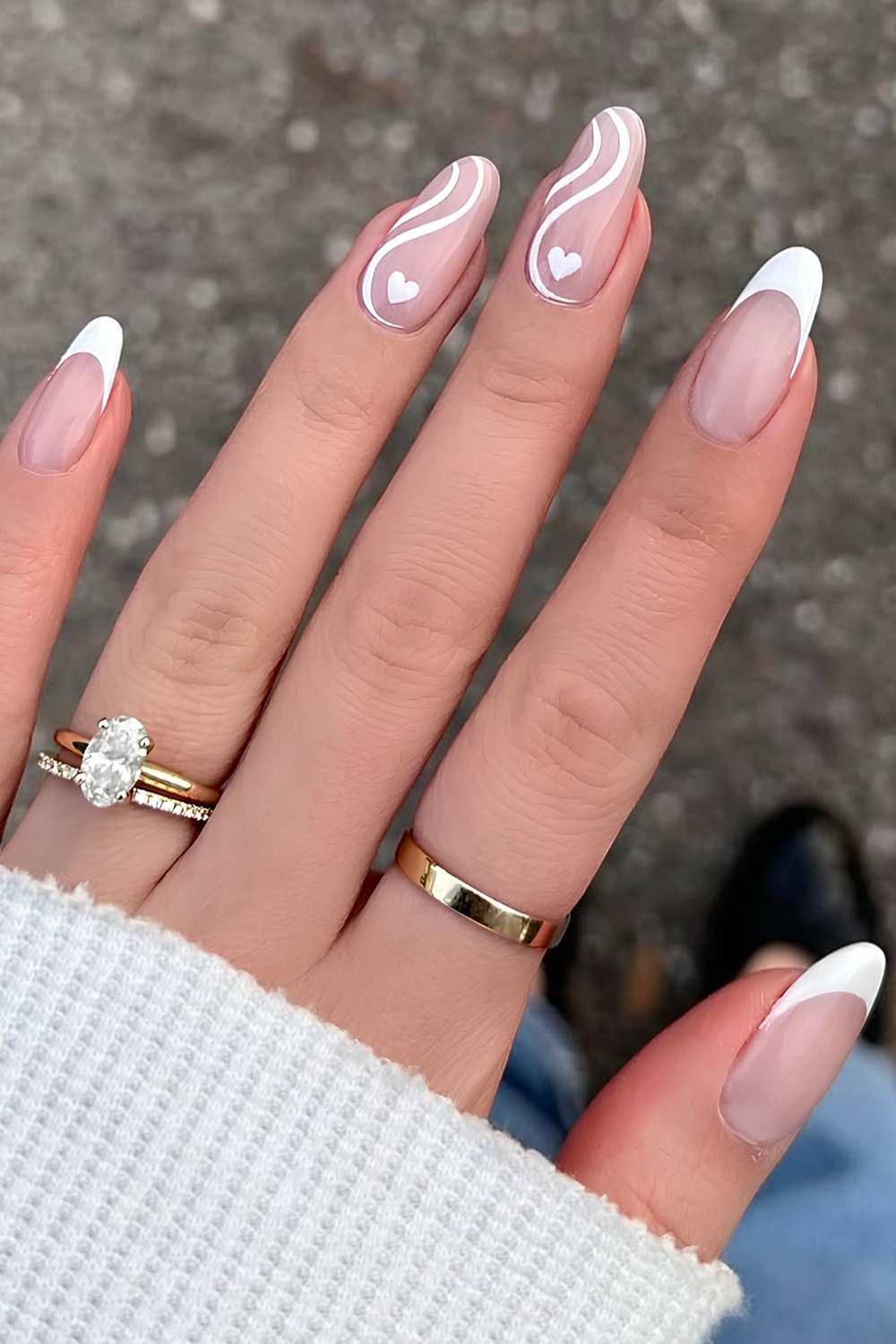 White French tips with hearts and swirls