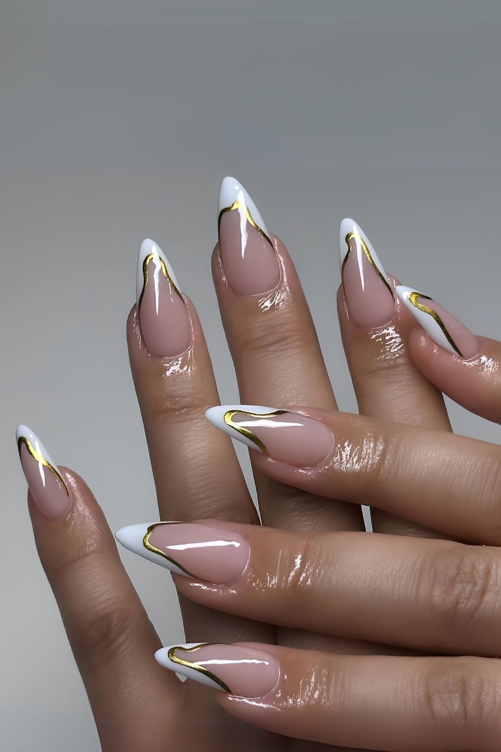 White and gold abstract French nails