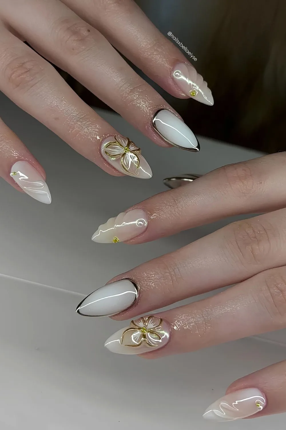 White and gold floral nails