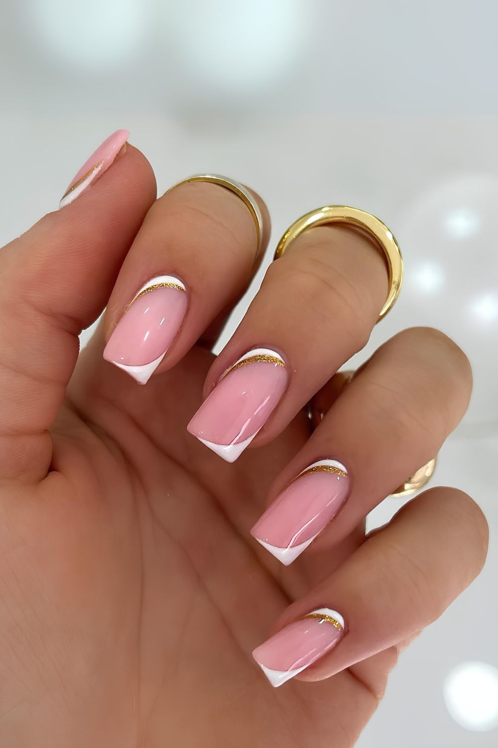 White and gold upside-down French nails