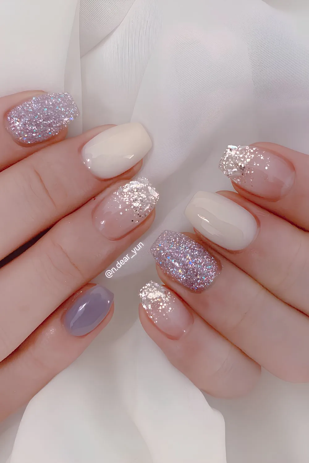 White and purple frosty nails