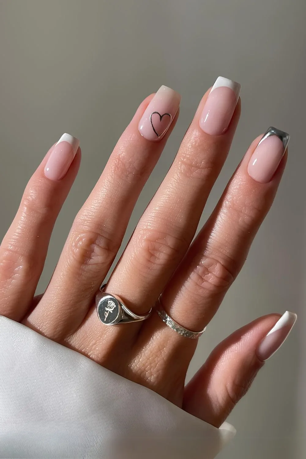 White and silver French nails with hearts