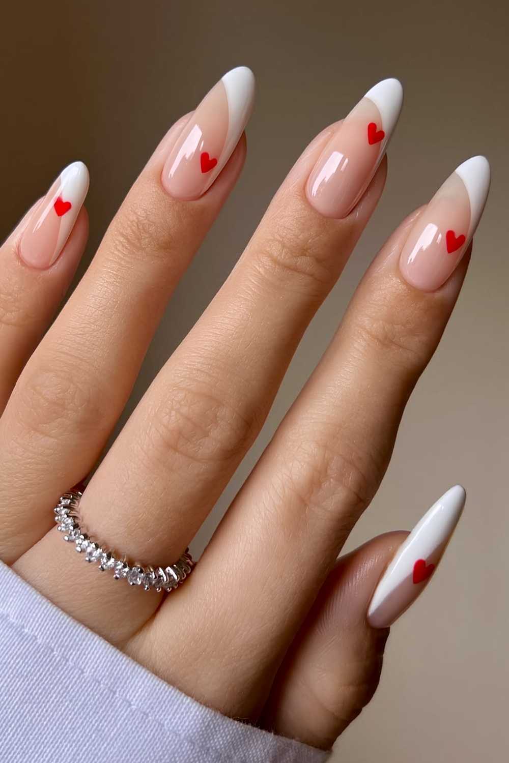 White angled French mani with hearts