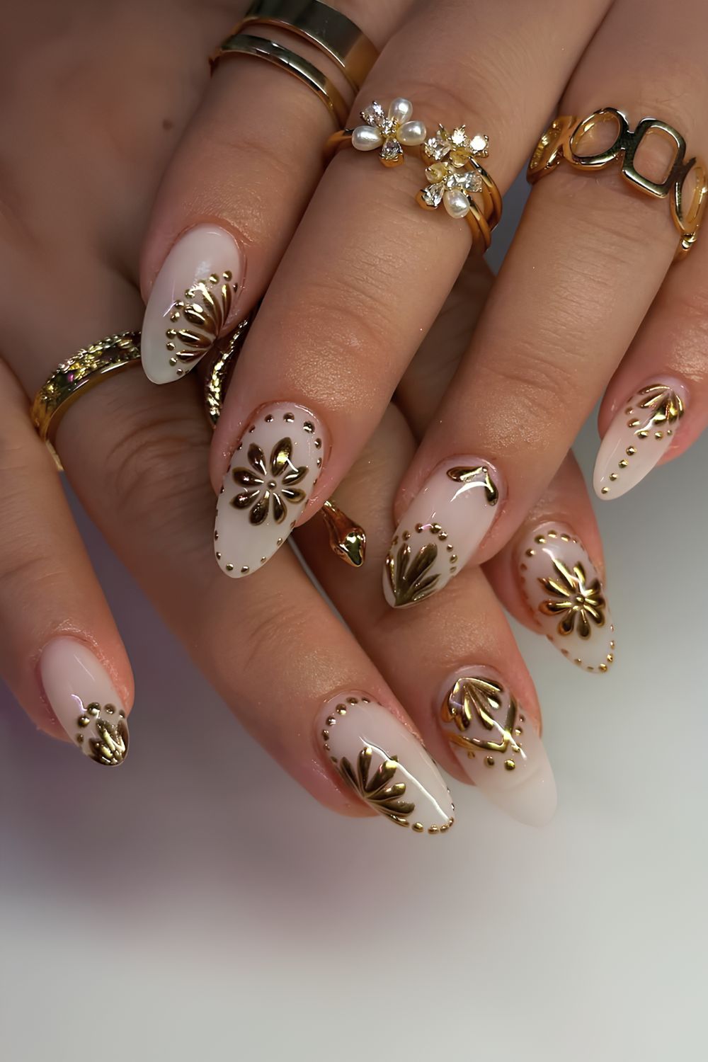 White nails with chrome flowers