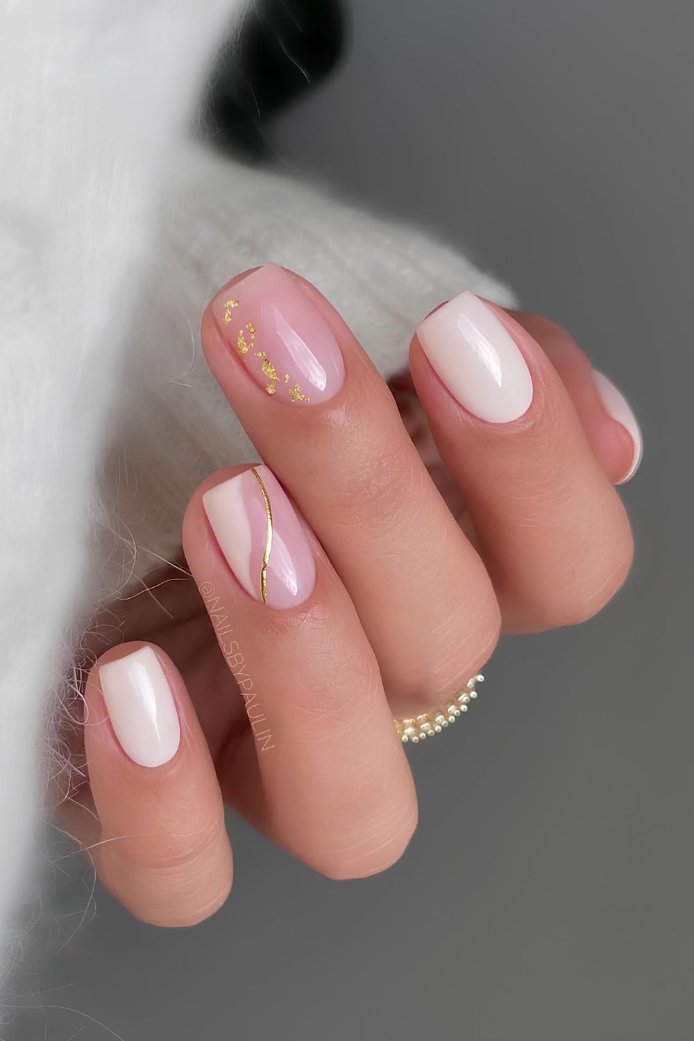 White nails with gold foil and line accents