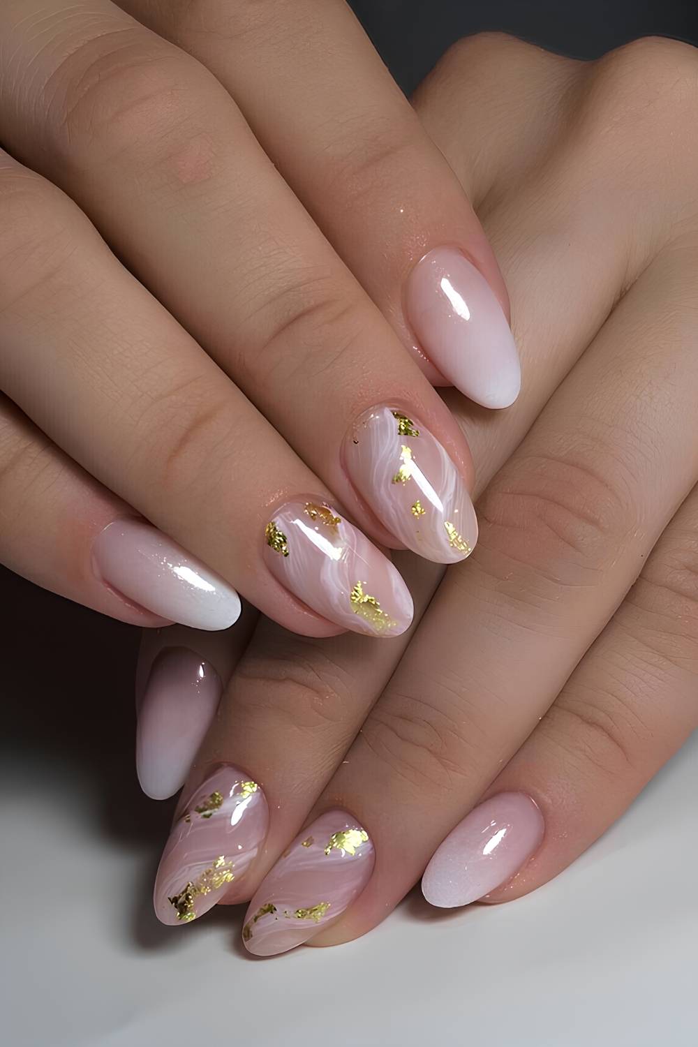 White ombre nails with marble details