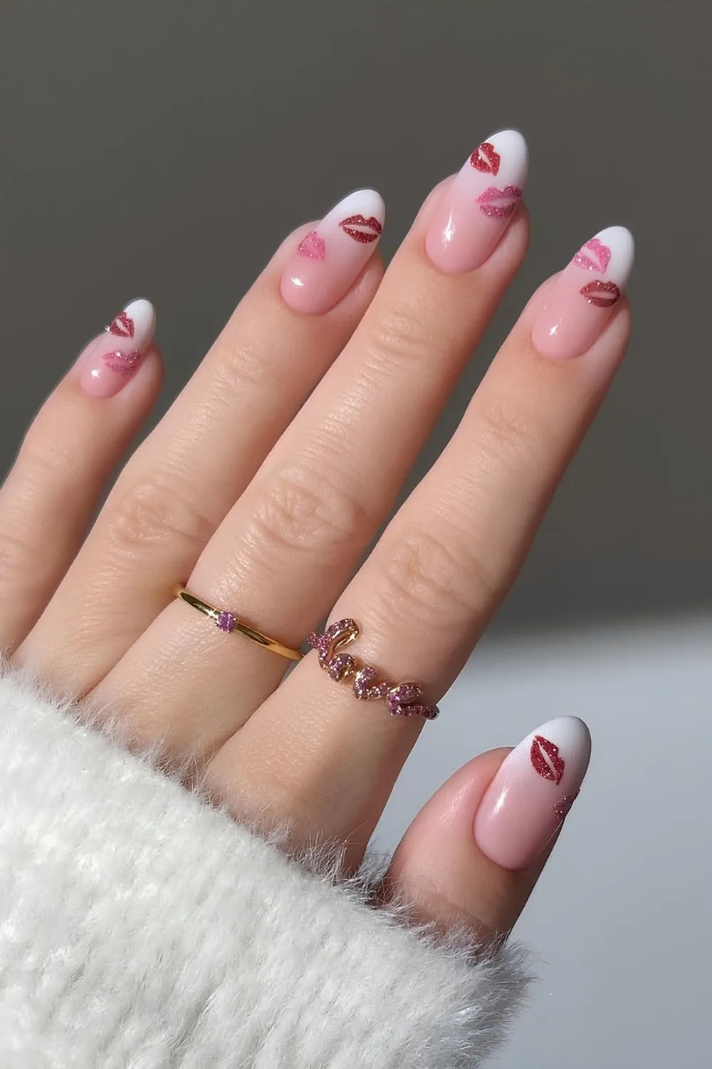 White ombre tip nails with kiss nail art