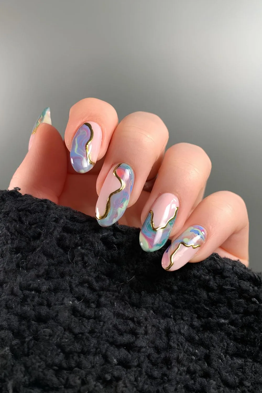 Abstract colorful marble tip nails with gold chrome swirls