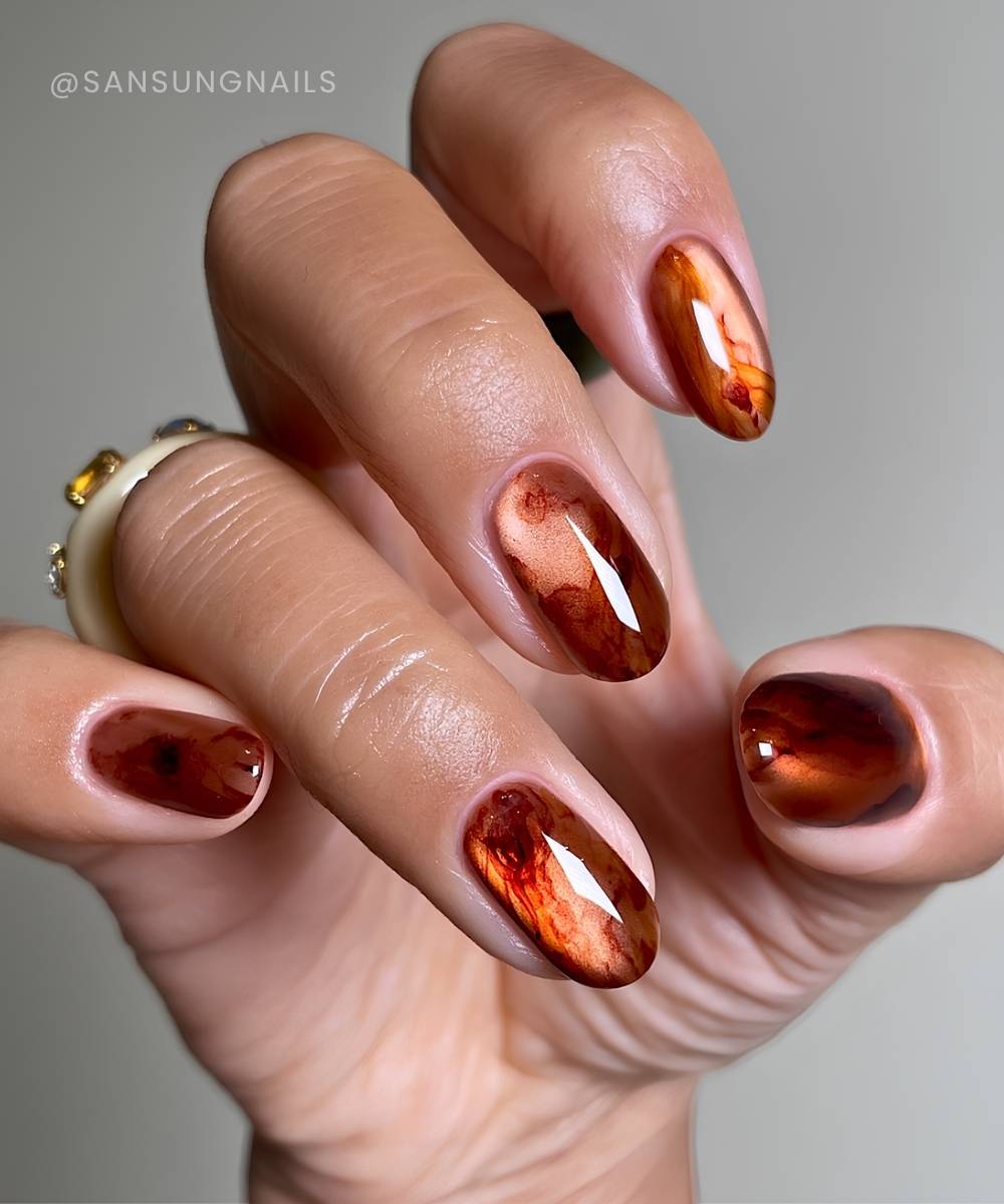 Amber marble cat eye nails