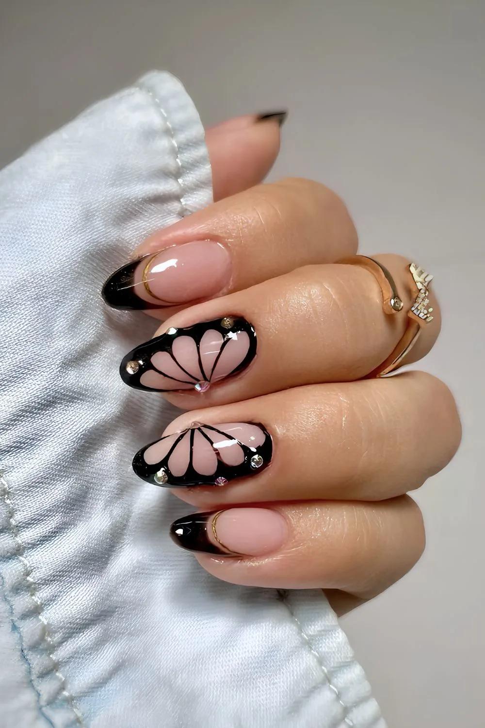 Black French mani with butterfly art