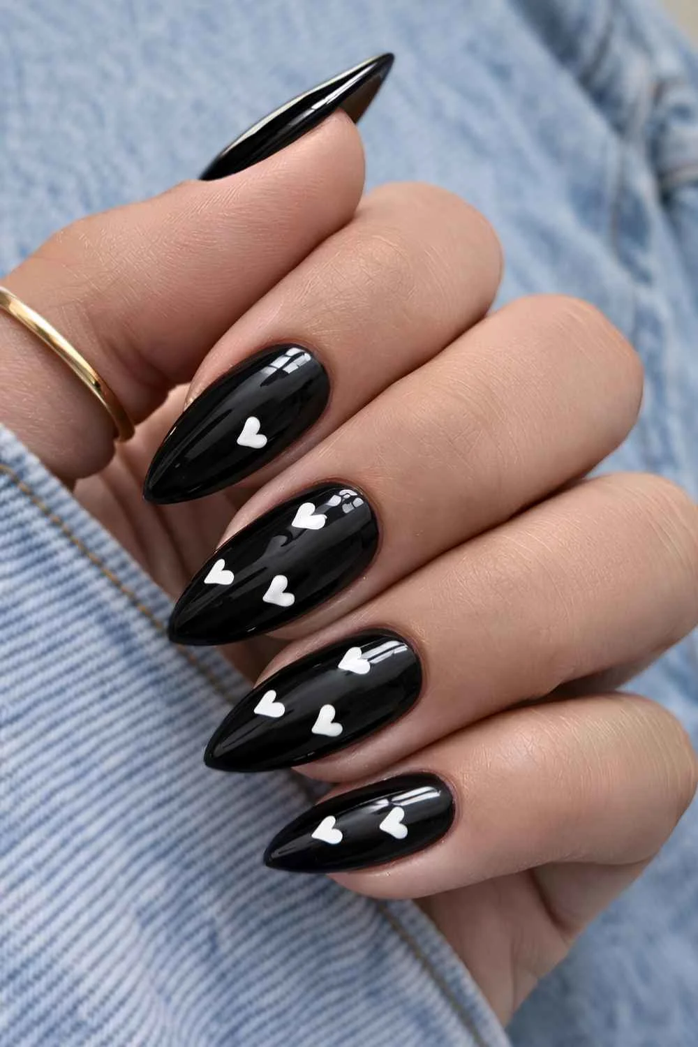 Black Valentines Day nails with white hearts