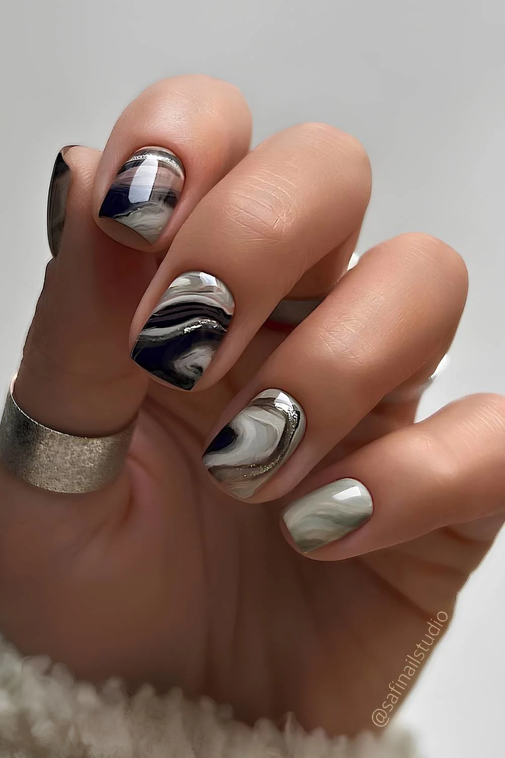 Black and gray marble mani with silver glitter