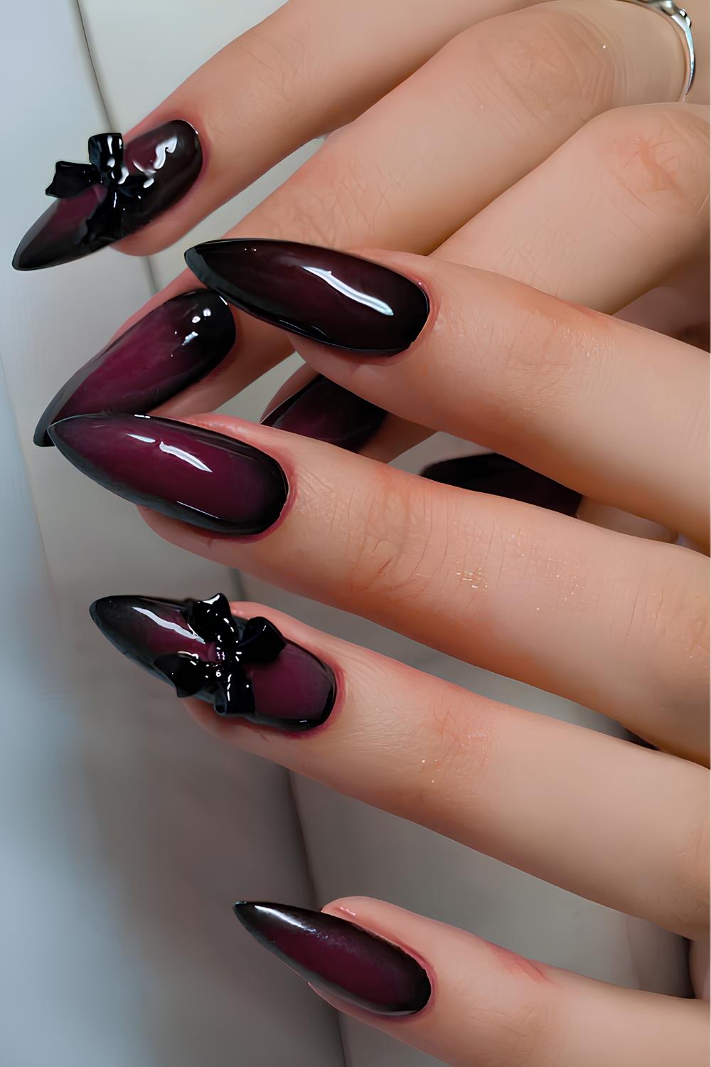 Black and red aura nails with 3D bows