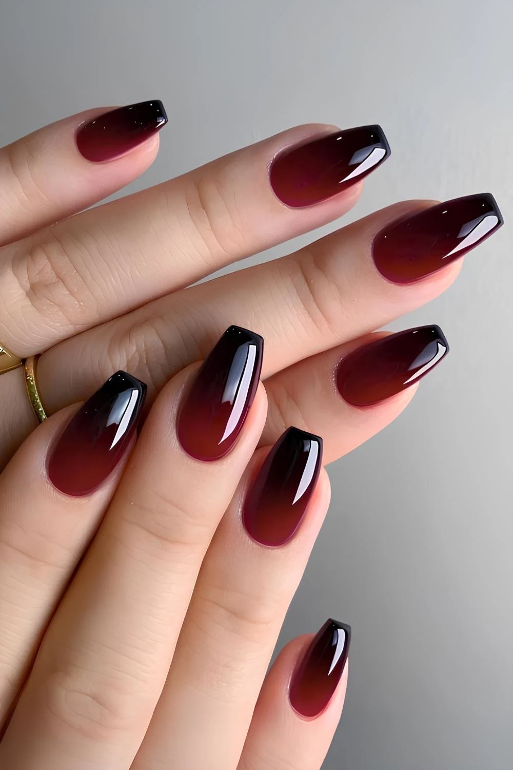 Black and red jelly ombre manicure