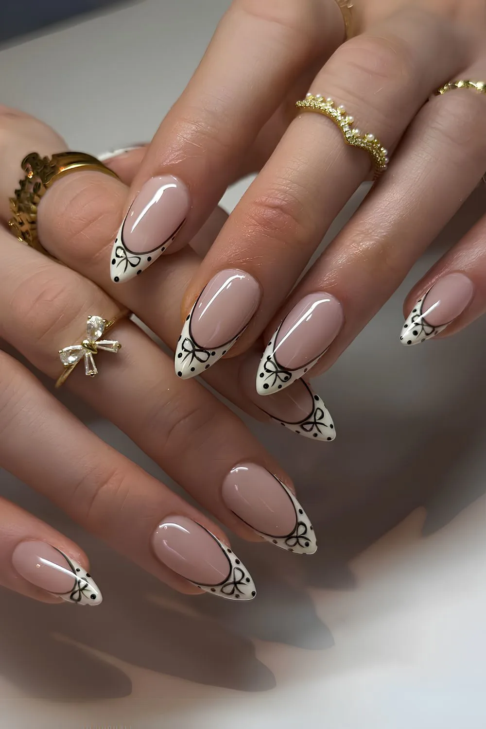 Black and white French mani with bows