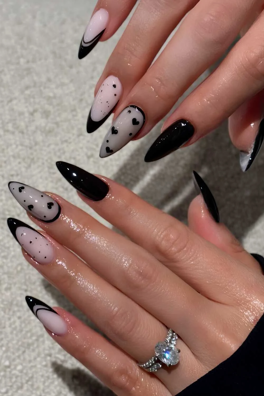 Black and white mix and match mani with hearts