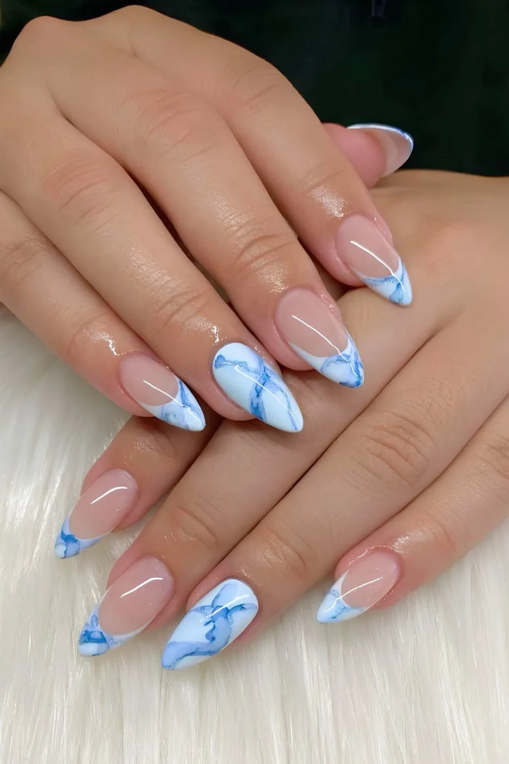 Blue and white marble French tip nails