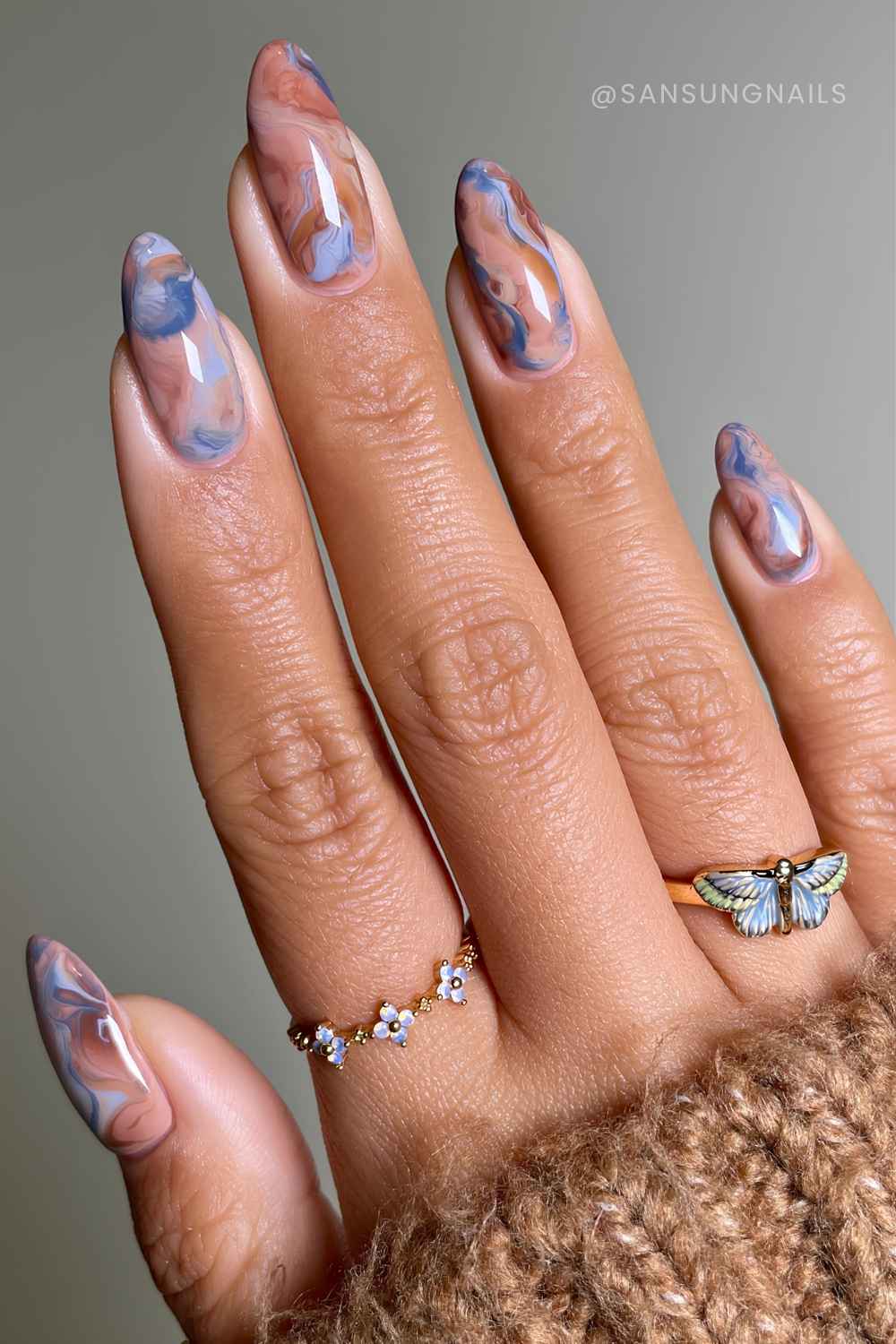 Brown and blue marble nails