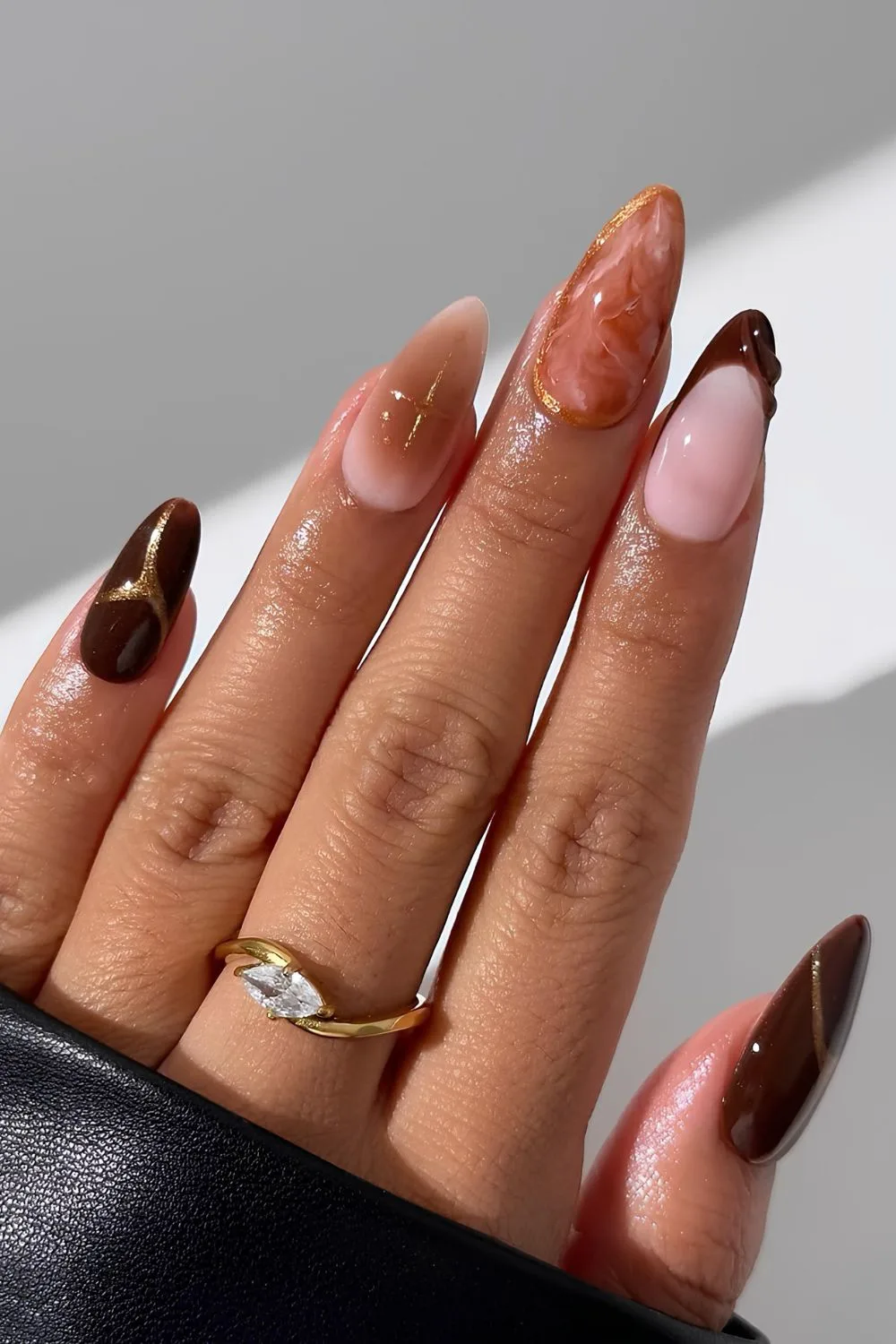 Brown mix and match nails with marble, aura, 3D and chrome design