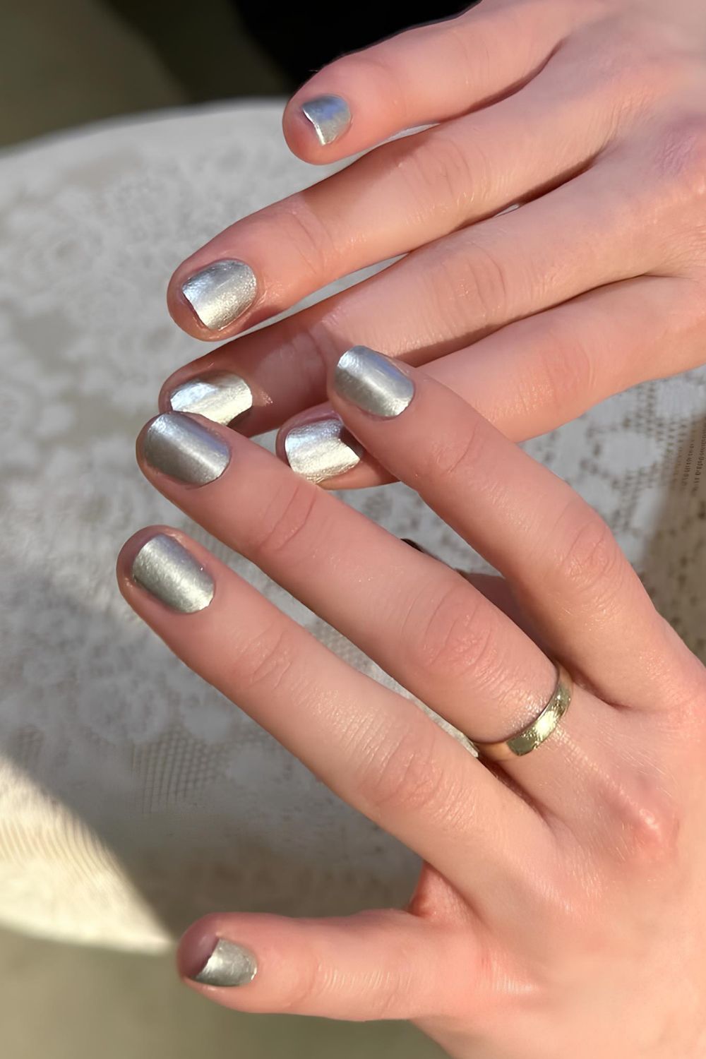 Brushed and short silver nails