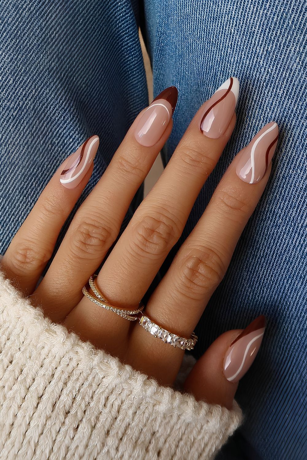 Burgundy and white swirly French nails