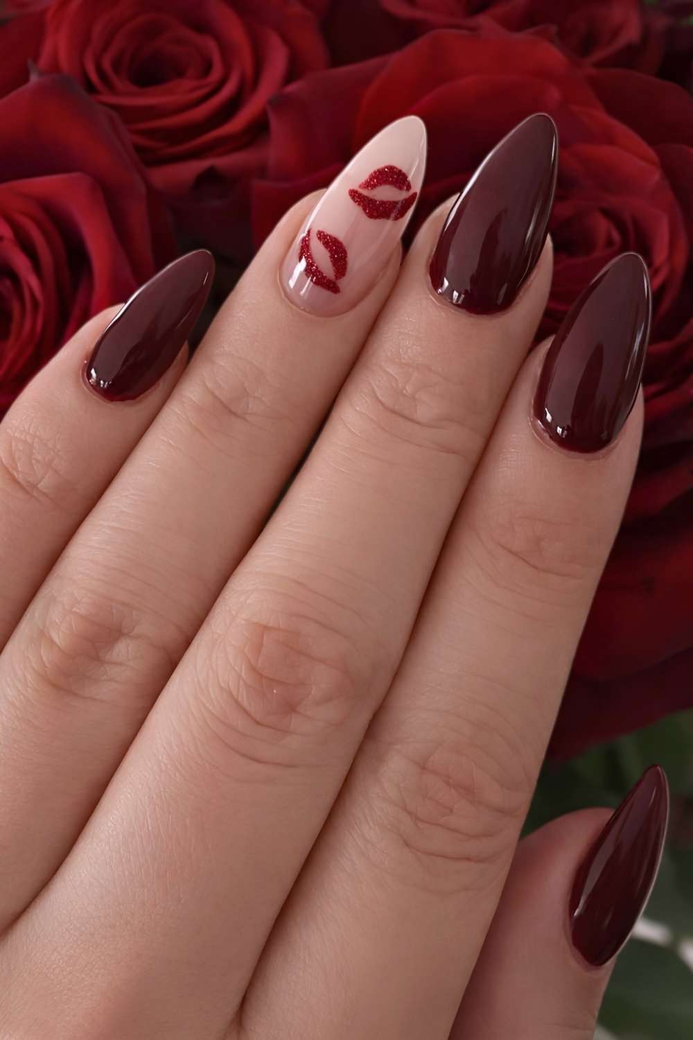 Burgundy nails with kissy lip art