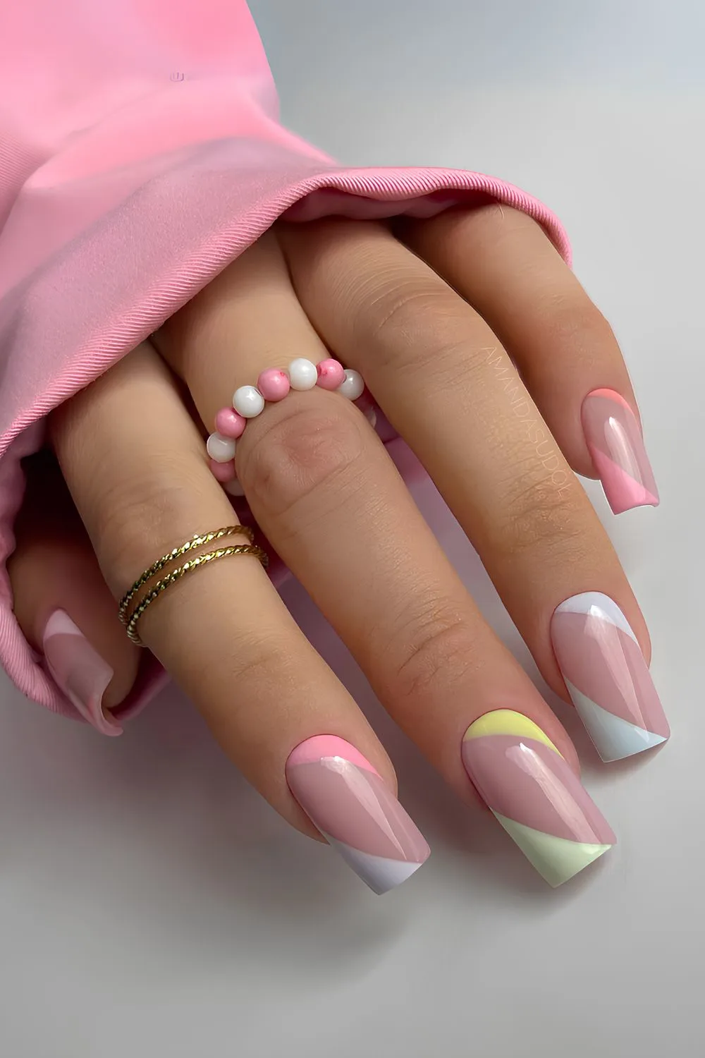 Colorful pastel nails with negative space design