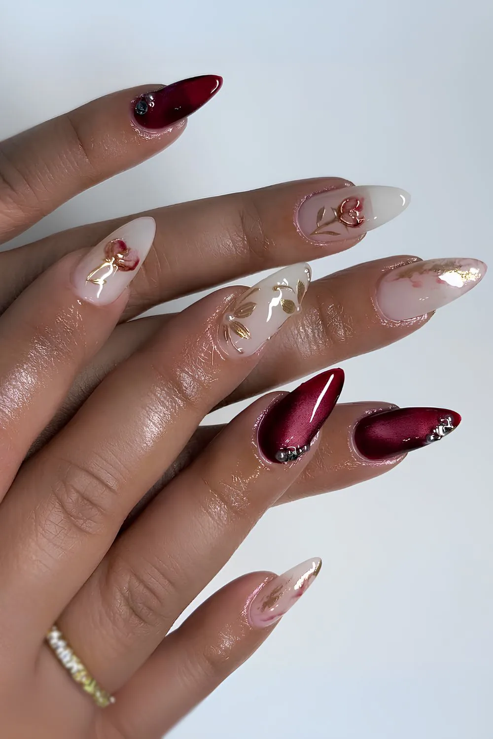 Dark red and white floral cat eye mani