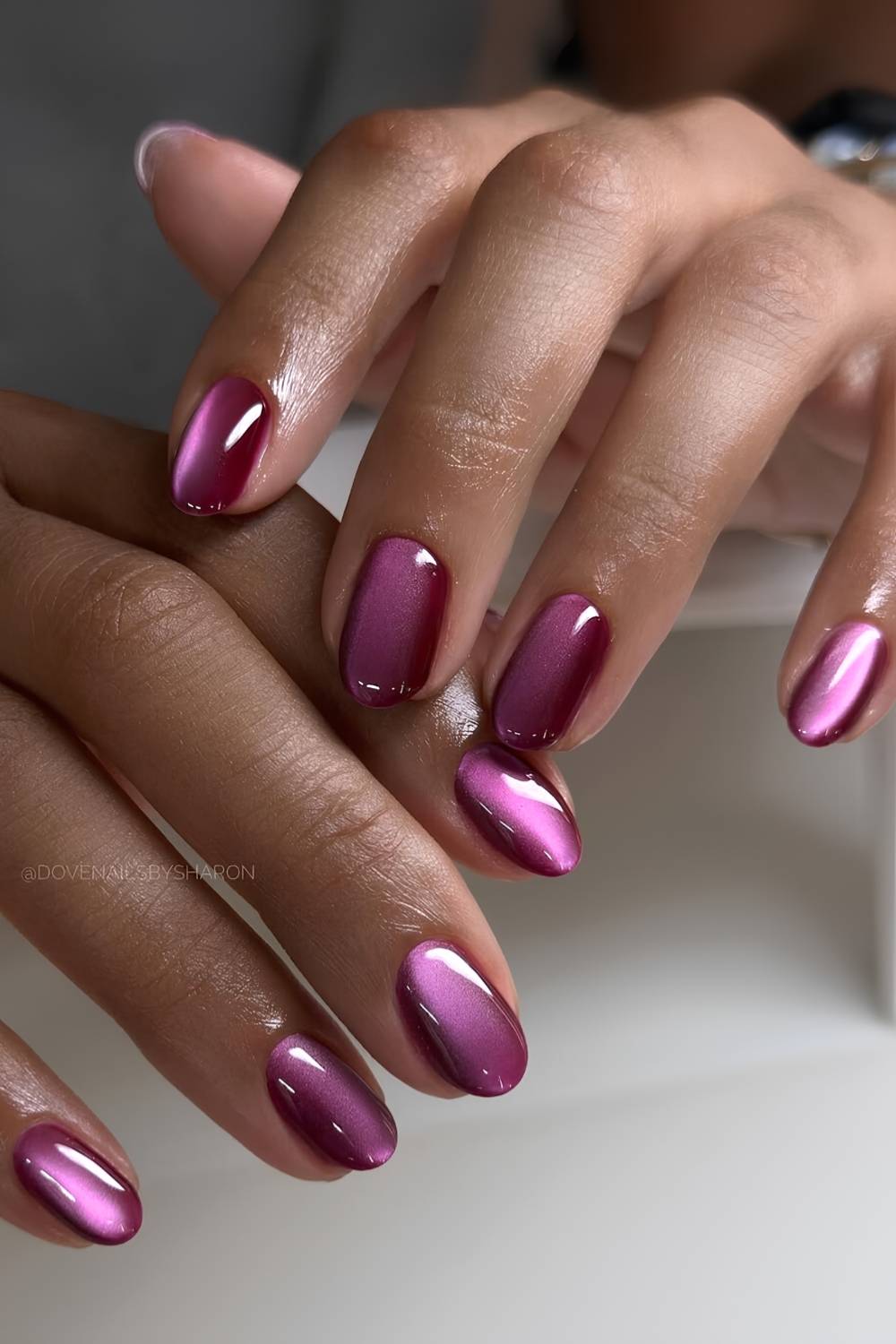 Deep purple cat eye manicure