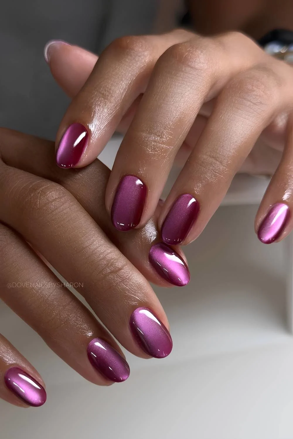 Deep purple cat eye manicure