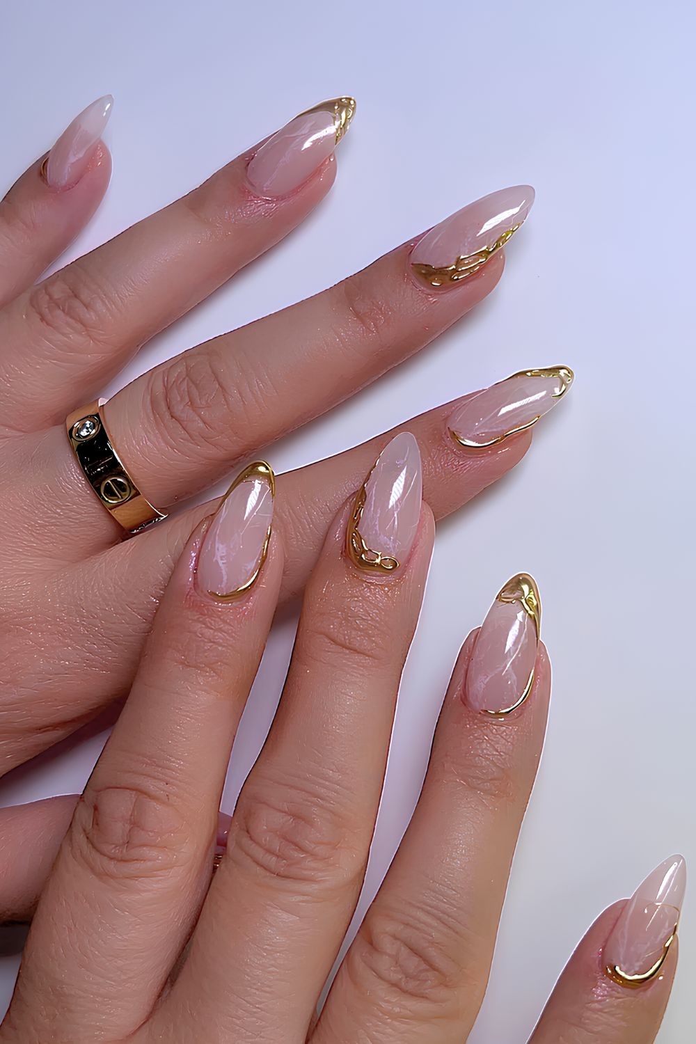 Elegant white marble nails with gold accents