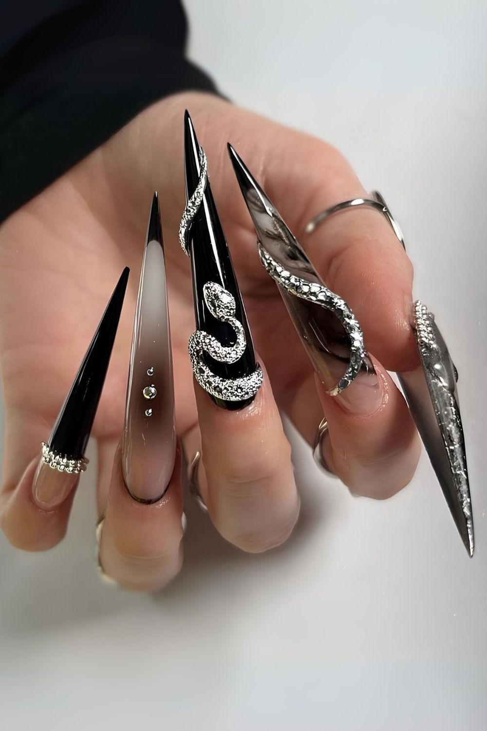 Extra long black and silver nail design