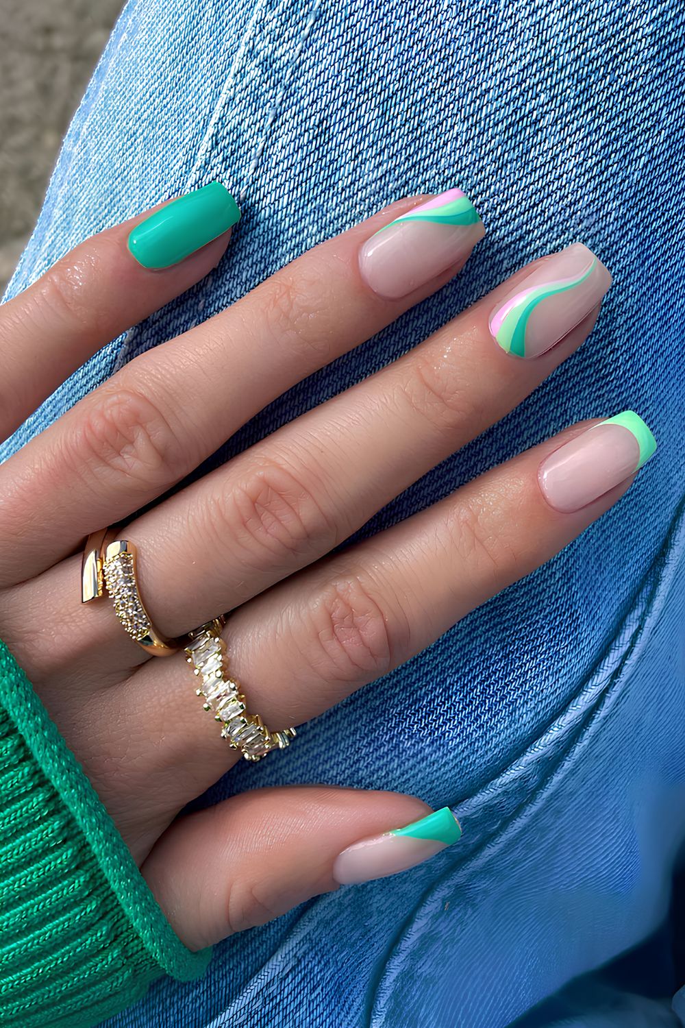 French and solid green mix nails with swirl accents