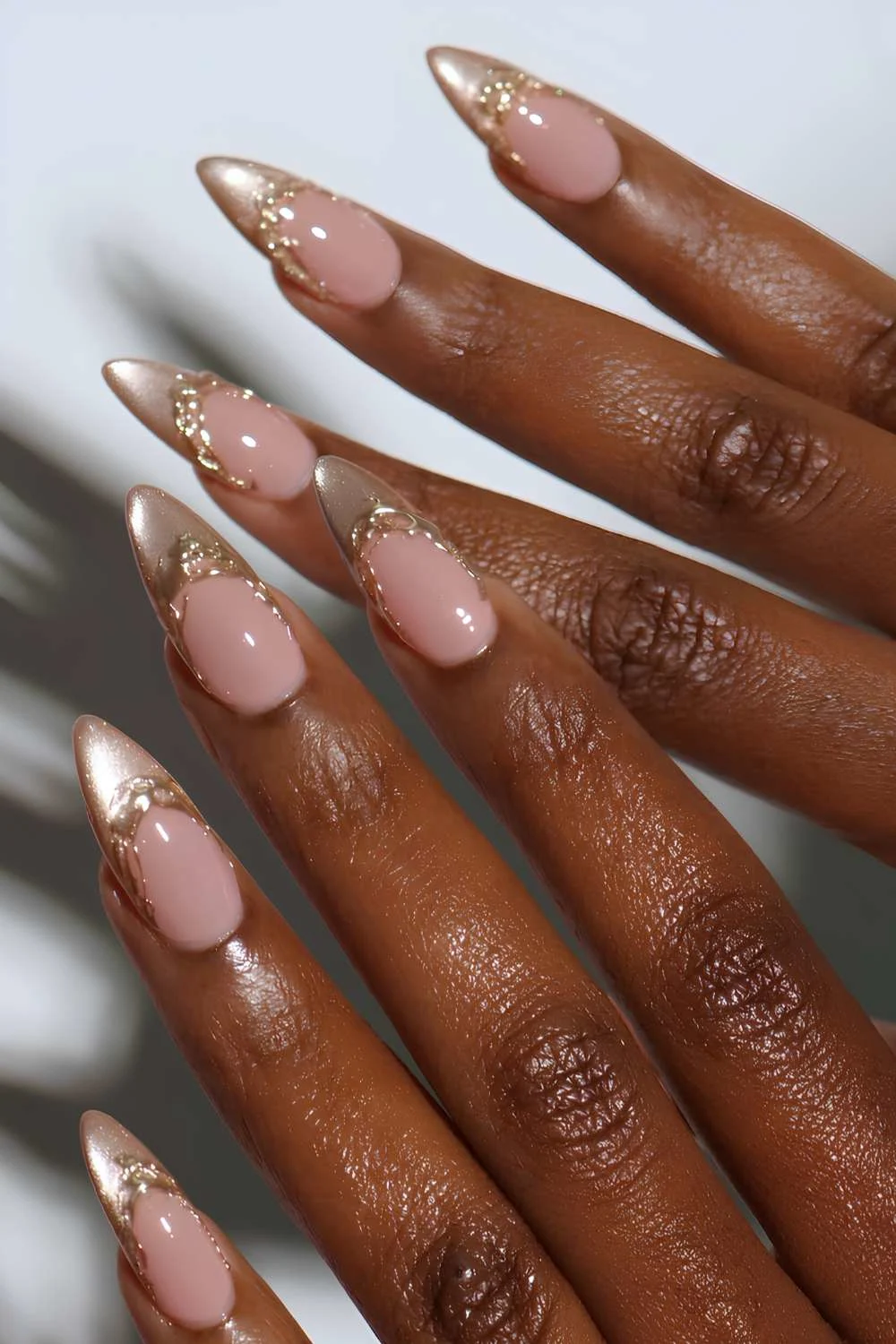 https://thepinkissue.com/wp-content/uploads/2025/02/Gold-cat-eye-French-manicure.jpg.webp?utm_source=chatgpt.com