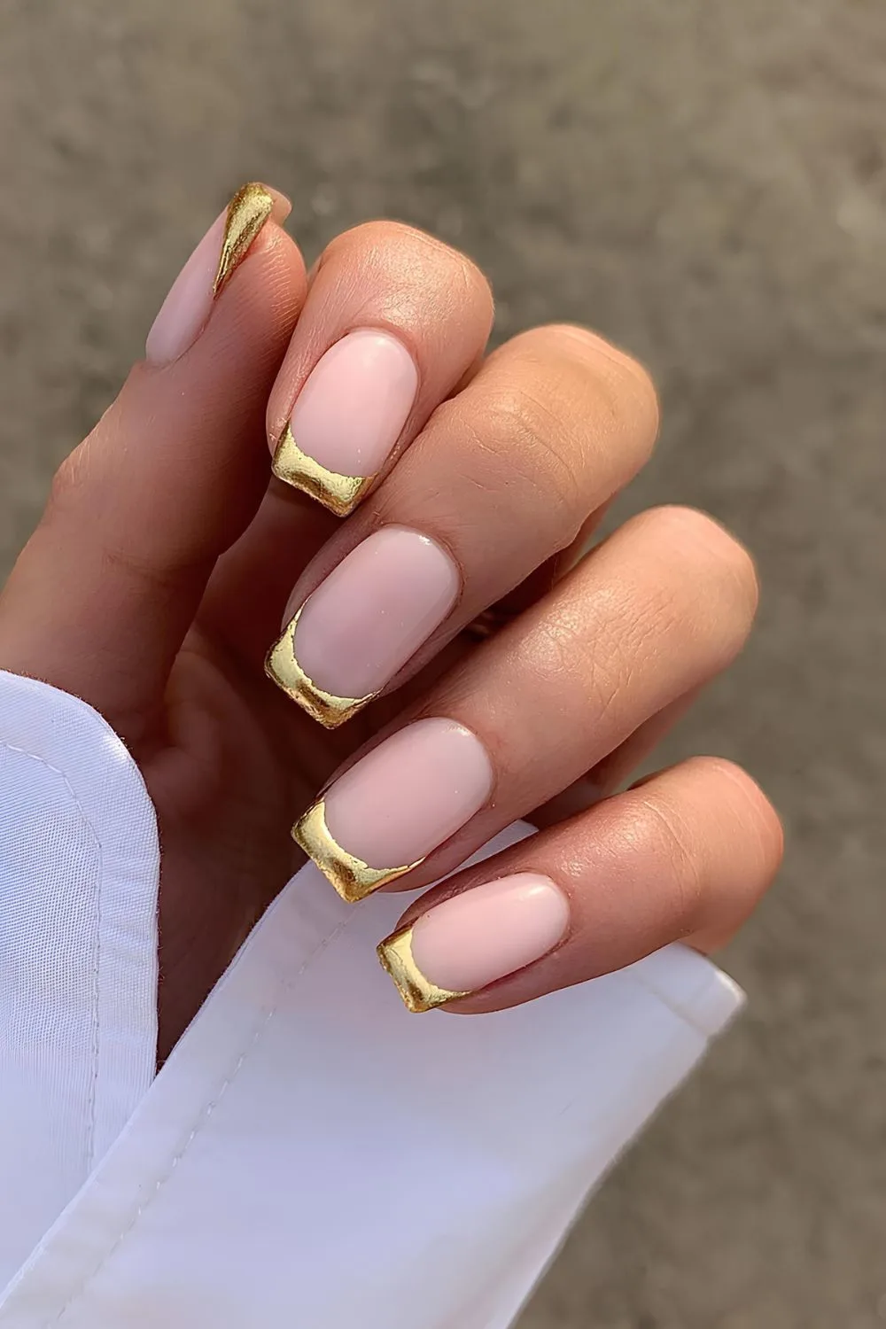 Gold chrome French tip nails