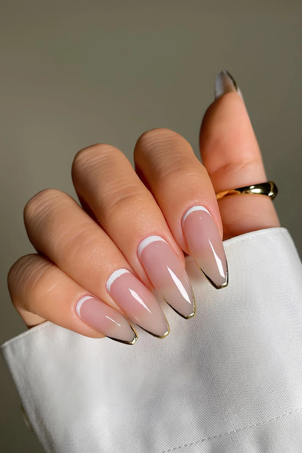 Gold chrome and white reverse French tip nails