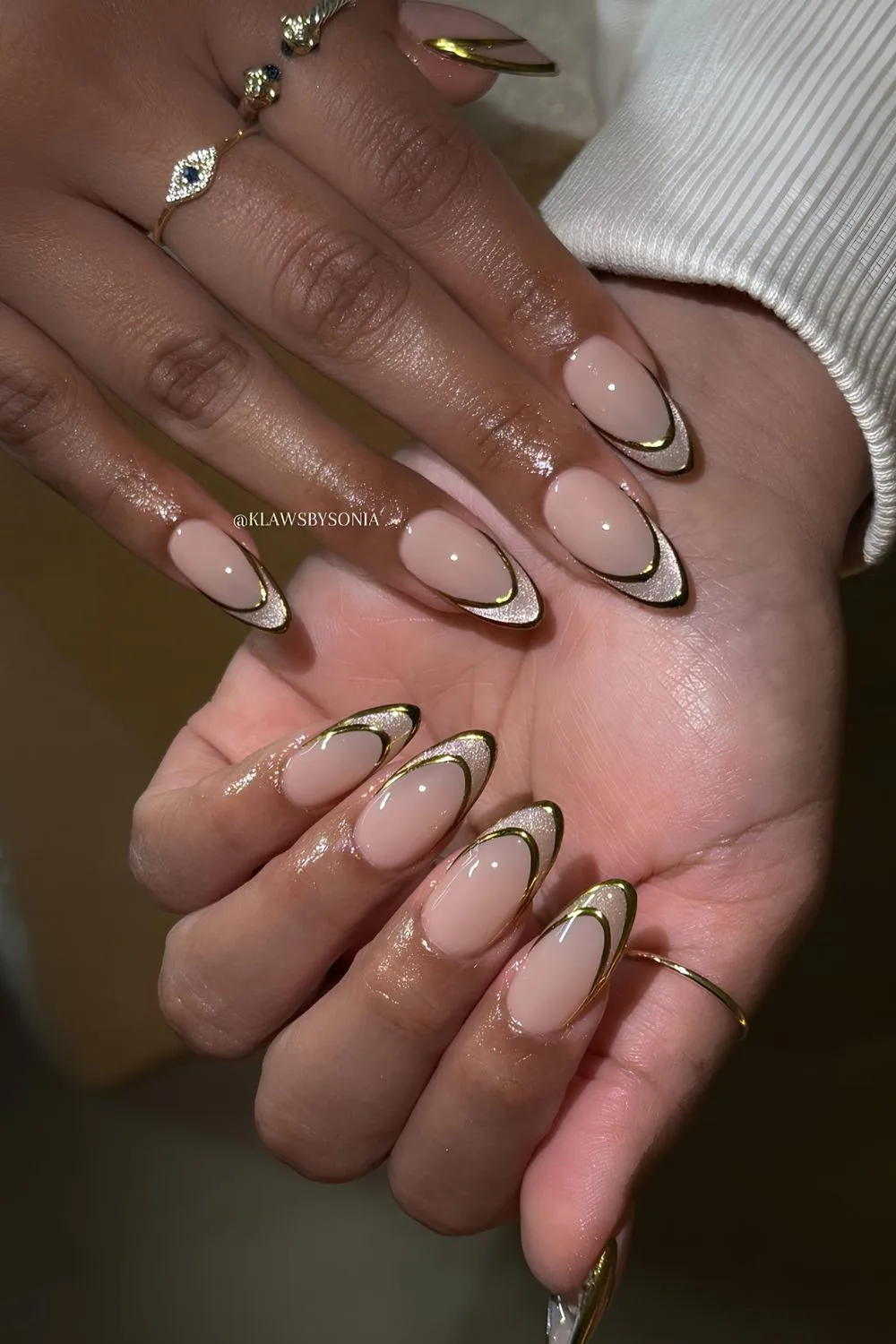 Gold chrome double French tip nails with velvet touch