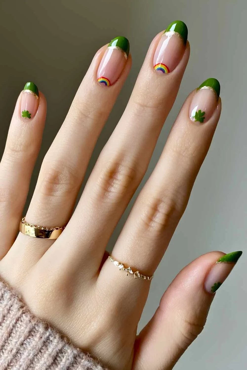 Green French mani with shamrock and rainbow art